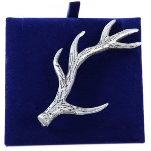 Anter kilt pin on cushion